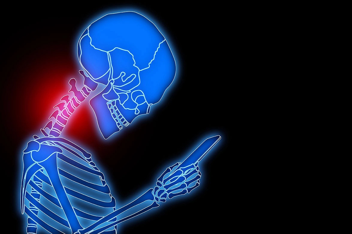 chiropractor treating patient with text neck