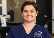 A logo for C.O.R.E. Health Centers featuring the text "C.O.R.E" in large, bold letters with a blue and gray swoosh above it. Below, it reads "Health Center" followed by "CHIROPRACTIC CARE | WELLNESS" in smaller text, with "Jeremiah Holmes DC" underneath.